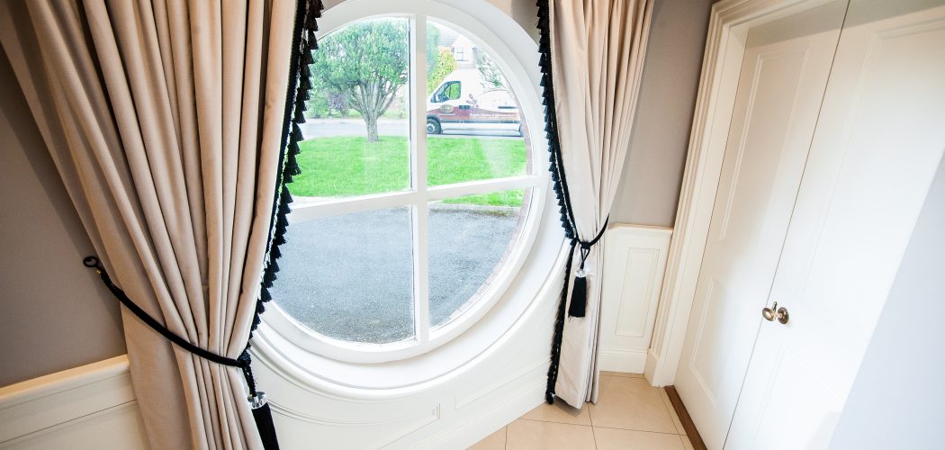 Custom Wall Panelling around circular window